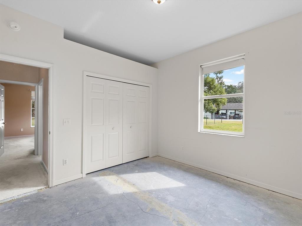 8551 Pratt Drive New Port Richey, FL 34654 - Photo 36 of 100 an empty room with windows