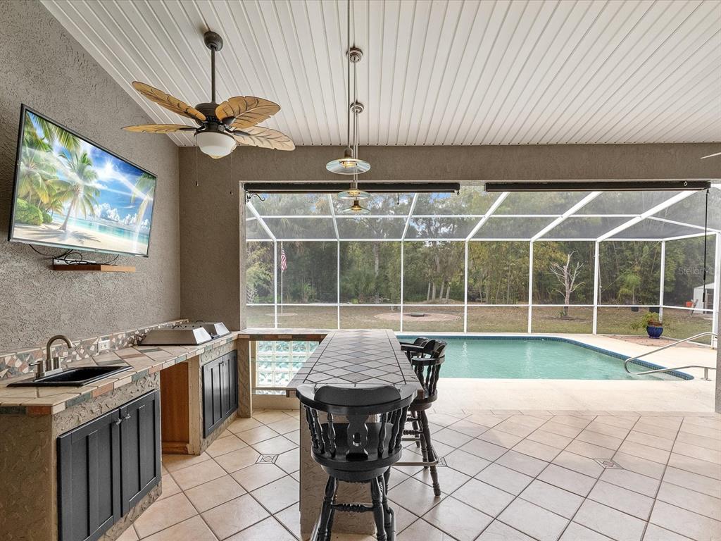 8551 Pratt Drive New Port Richey, FL 34654 - Photo 38 of 100 a view of a dining room with furniture window and outside view