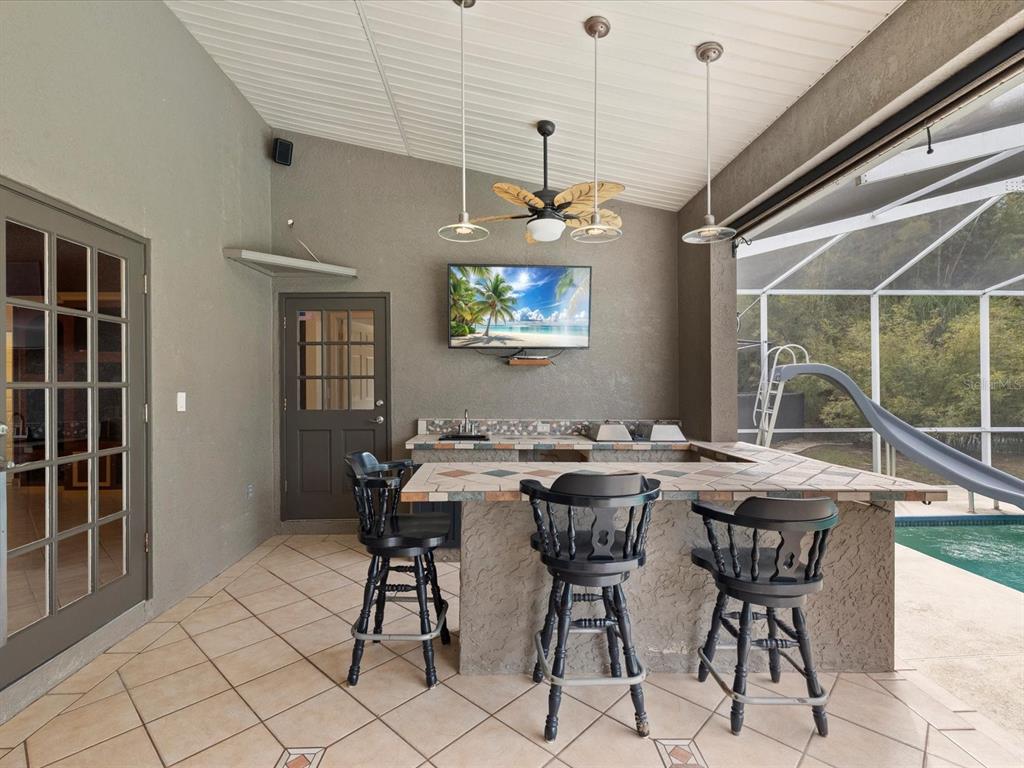 8551 Pratt Drive New Port Richey, FL 34654 - Photo 40 of 100 a view of a dining room with furniture