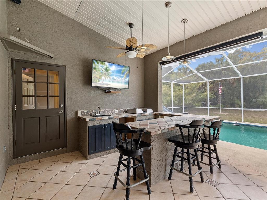 8551 Pratt Drive New Port Richey, FL 34654 - Photo 5 of 100 a view of a dining room with furniture window and outside view