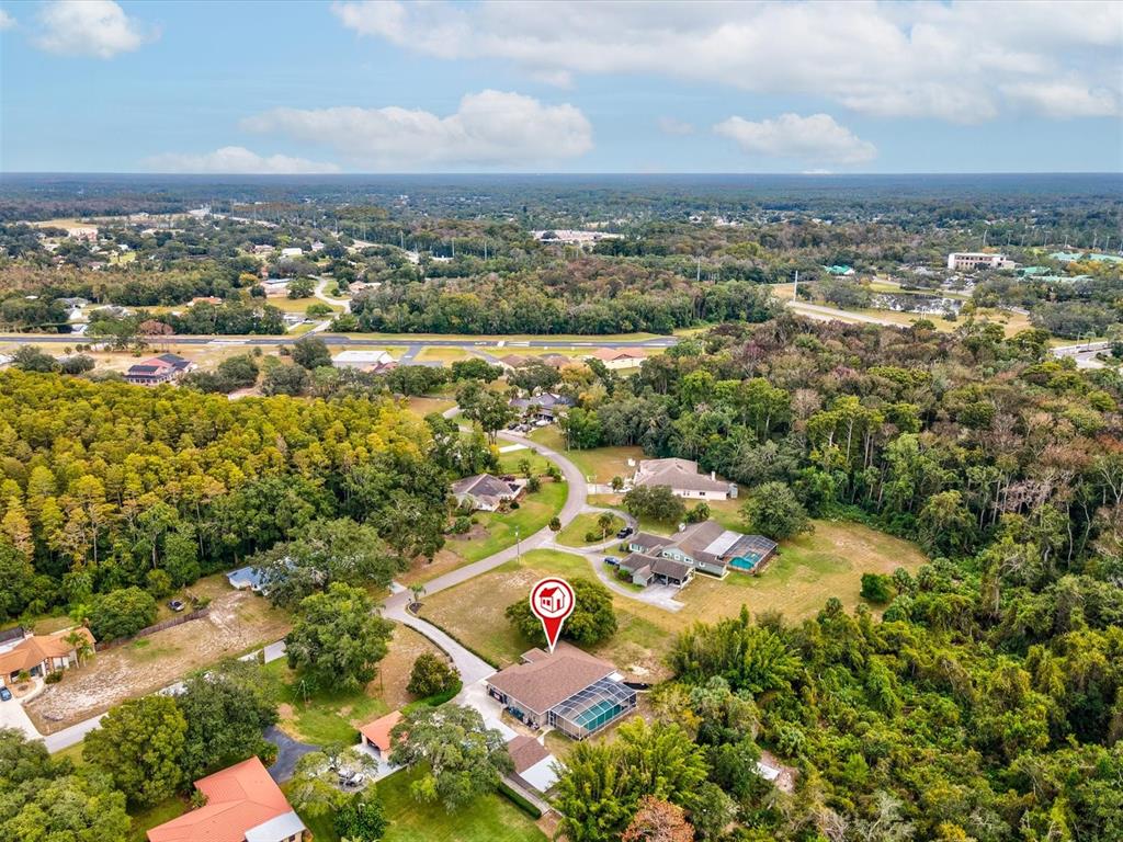 8551 Pratt Drive New Port Richey, FL 34654 - Photo 89 of 100 an aerial view of a city with lots of residential buildings
