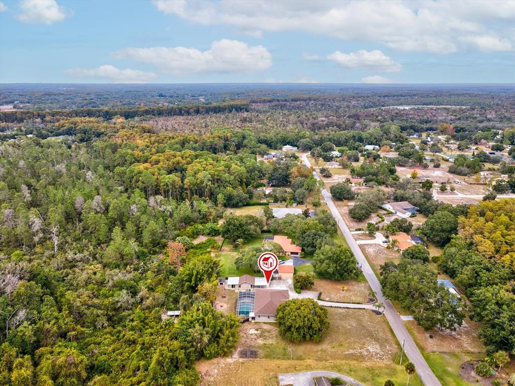 8551 Pratt Drive New Port Richey, FL 34654 - Photo 90 of 100 an aerial view of residential houses with outdoor space