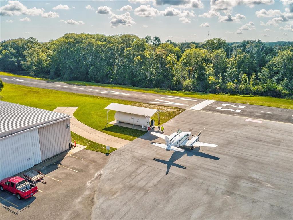 8551 Pratt Drive New Port Richey, FL 34654 - Photo 93 of 100 a view of a swimming pool with lounge chair