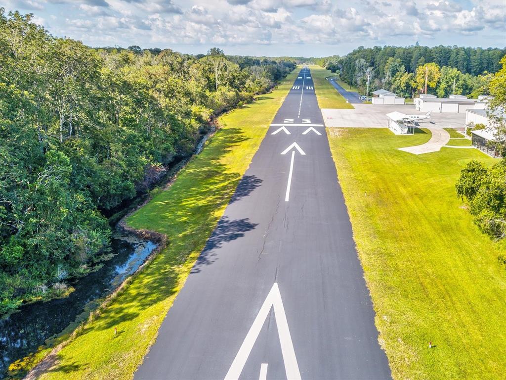 8551 Pratt Drive New Port Richey, FL 34654 - Photo 97 of 100 a view of swimming pool with a large pool and lawn chairs