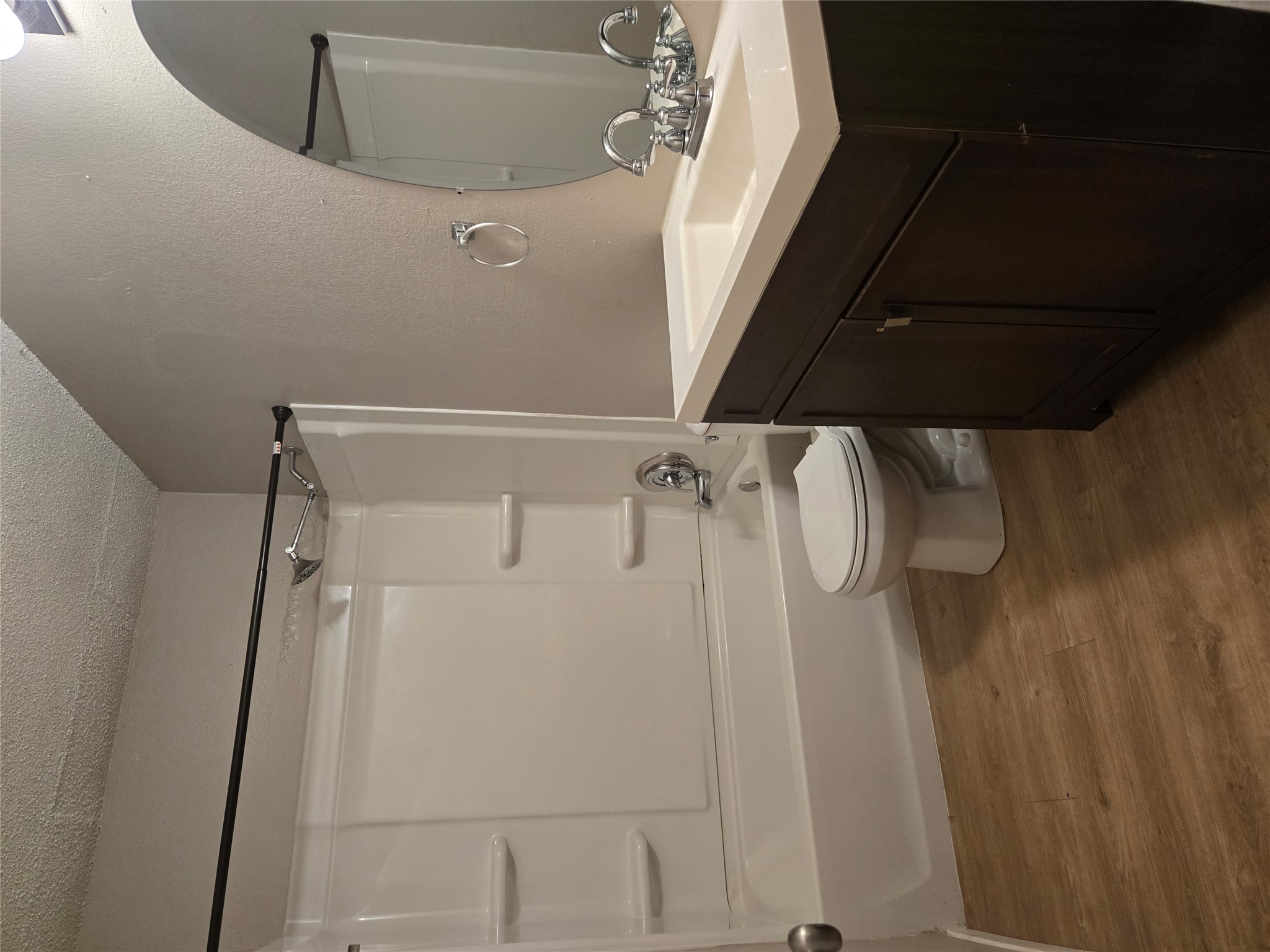 1011 Ridgemont Street Round Rock, TX 78664 - Photo 8 of 14 a bathroom with a sink and a mirror