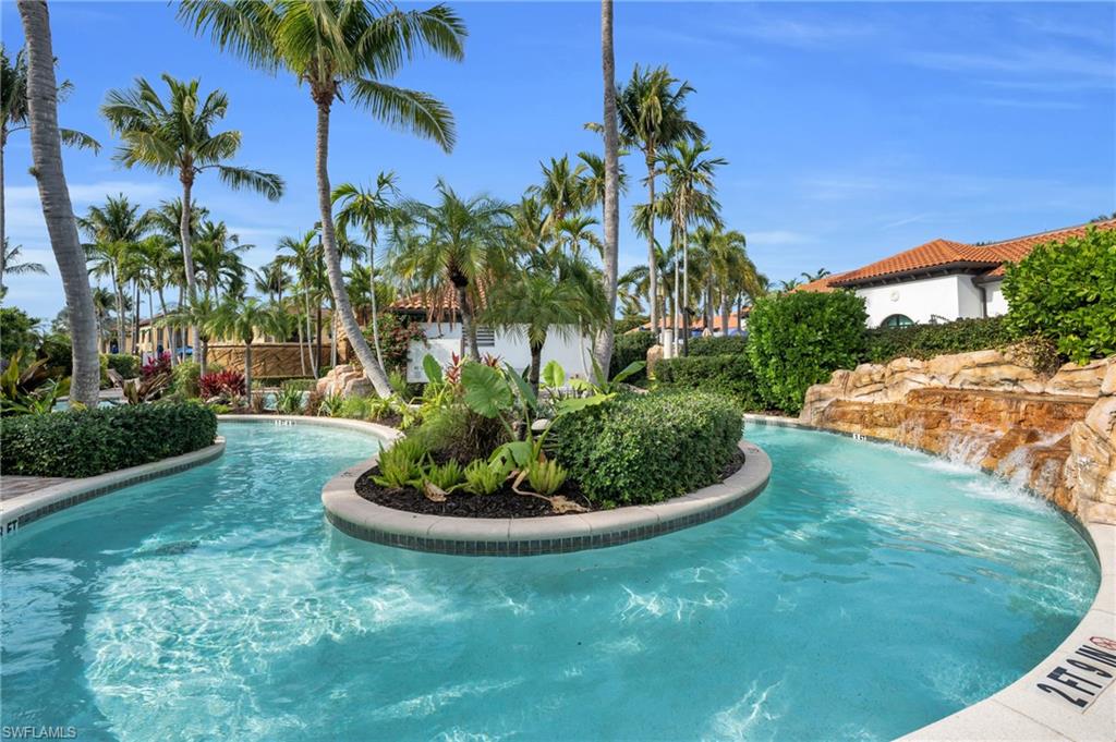 985 Sandpiper Street, Unit I103 Naples, FL 34102 - Photo 26 of 32 a view of a garden