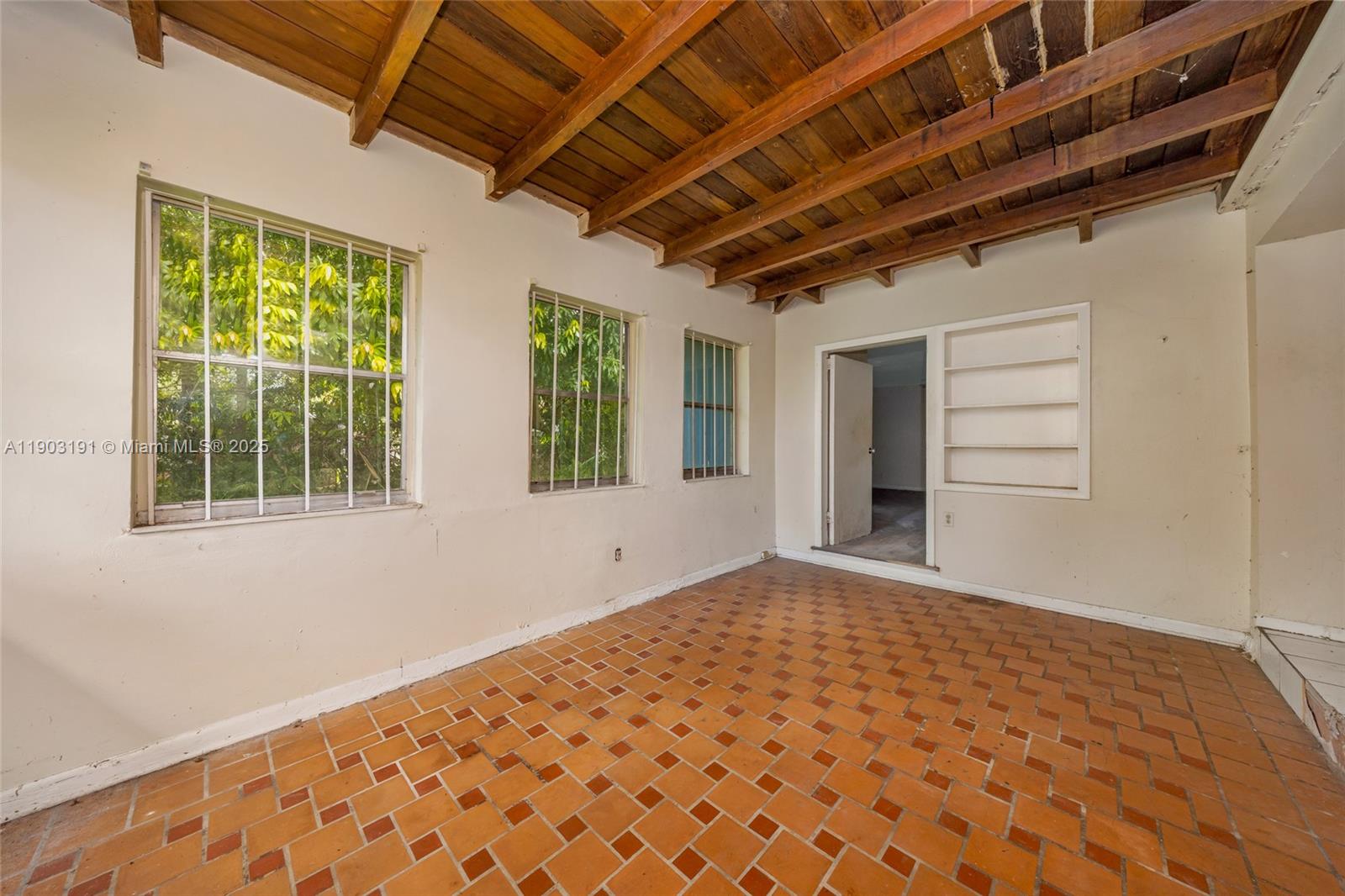 75 Northwest 83rd Street Miami, FL 33150 - Photo 15 of 47 a view of an empty room with a window