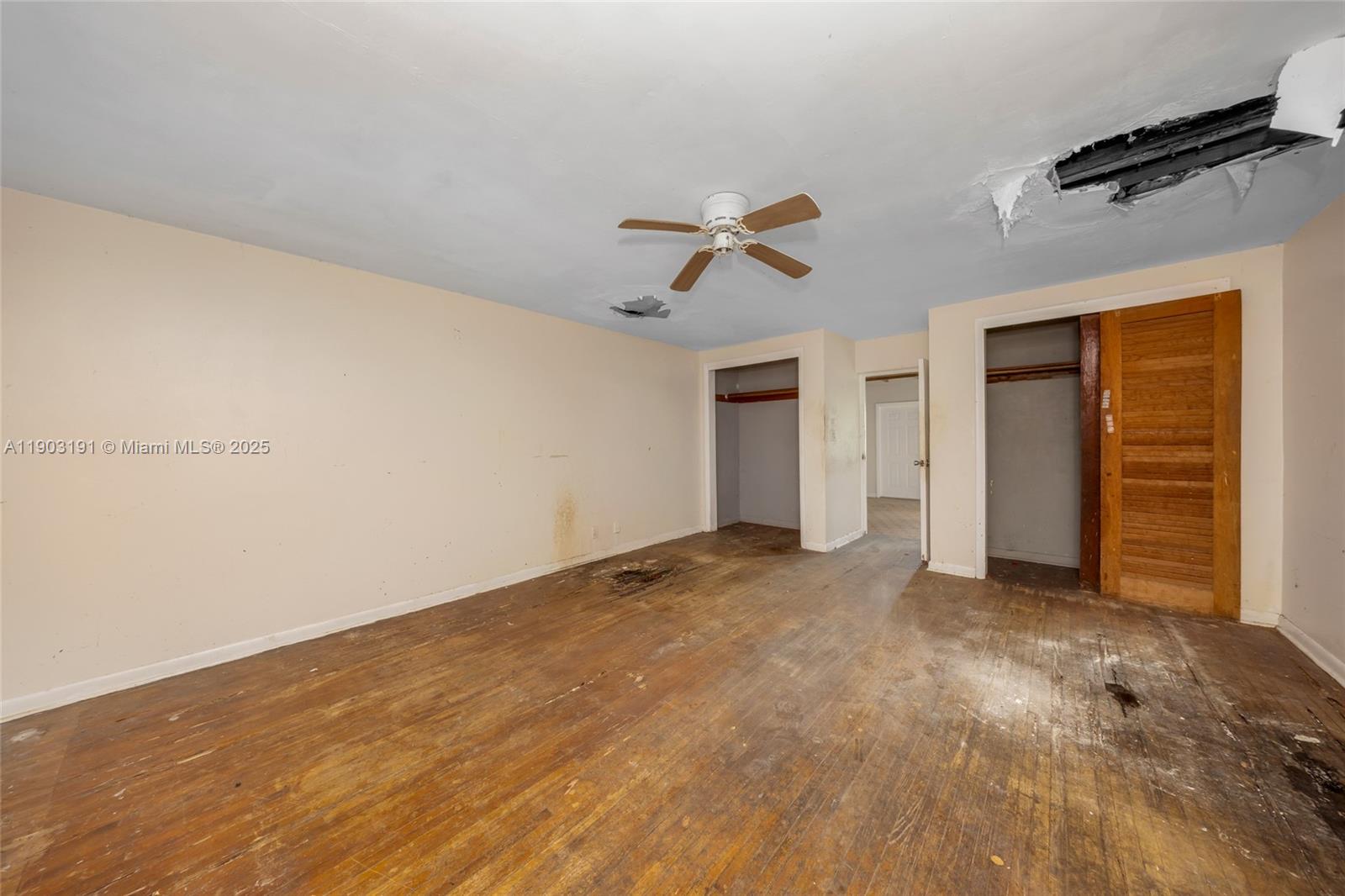 75 Northwest 83rd Street Miami, FL 33150 - Photo 27 of 47 a view of empty room with ceiling fan