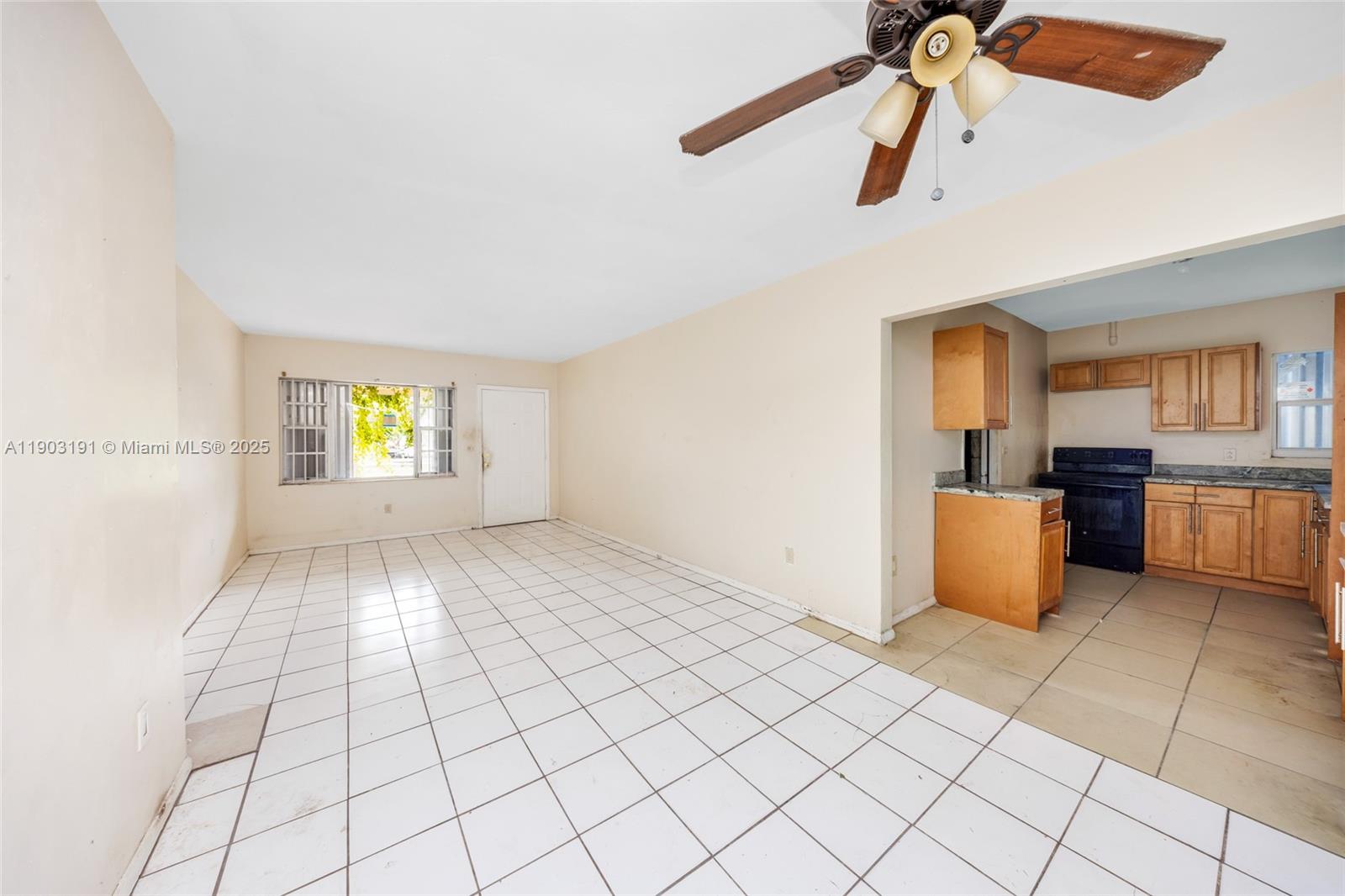 75 Northwest 83rd Street Miami, FL 33150 - Photo 3 of 47 a view of an empty room and window