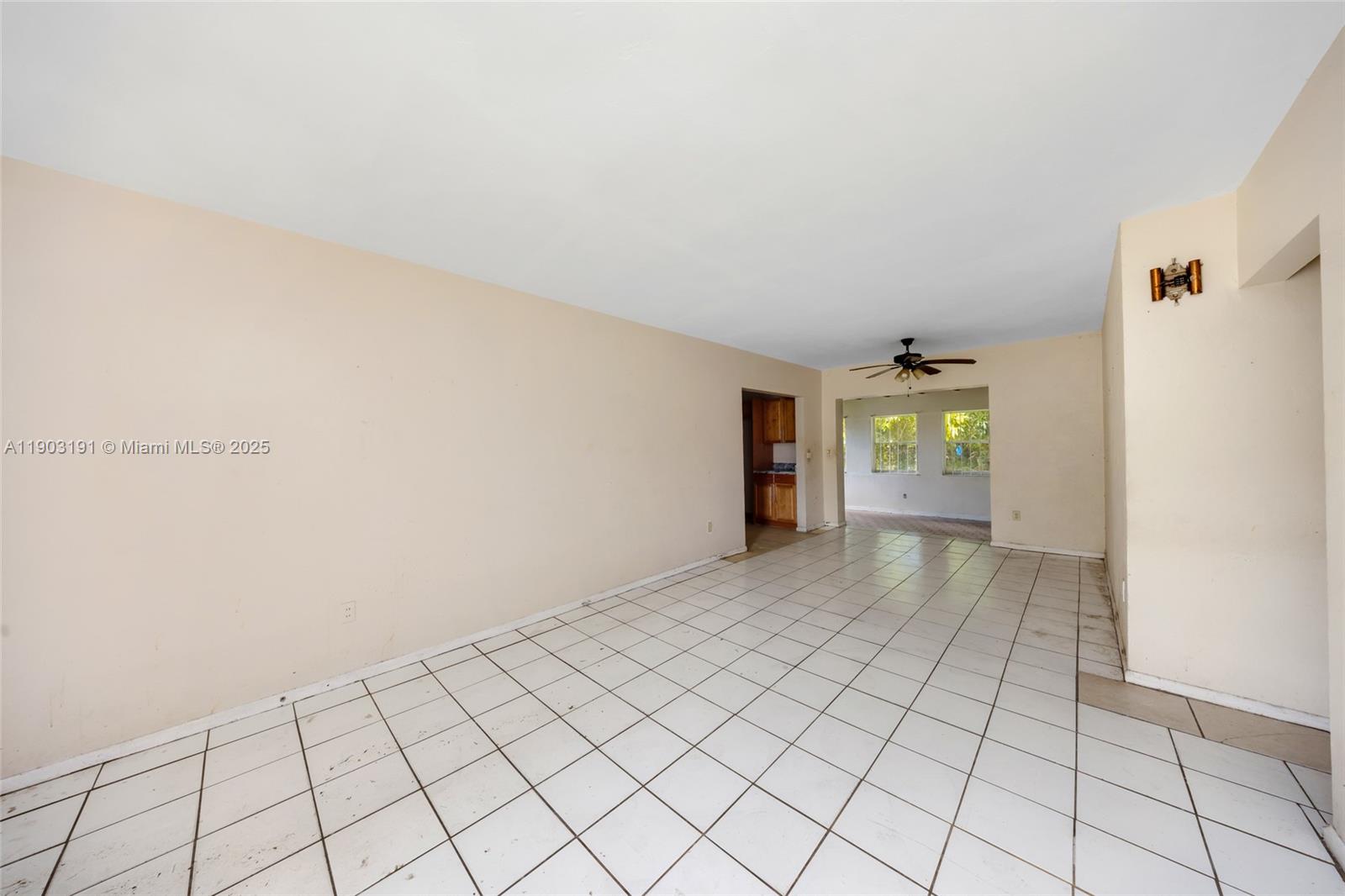 75 Northwest 83rd Street Miami, FL 33150 - Photo 7 of 47 a view of an empty room and window