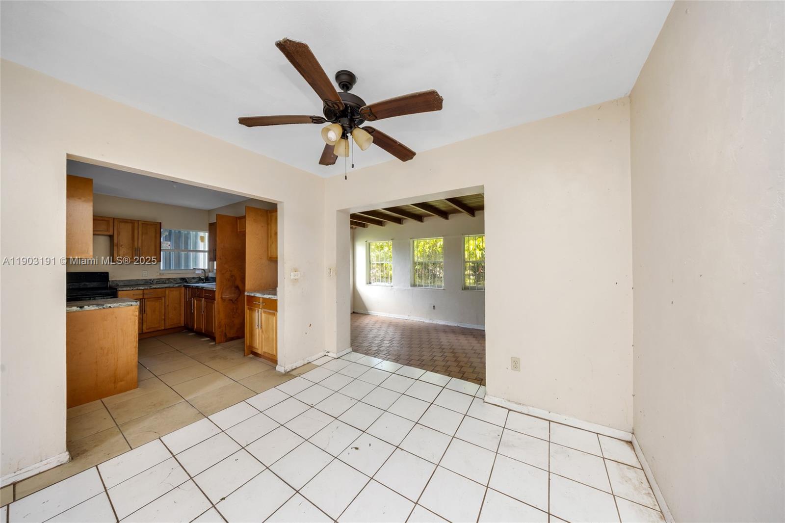 75 Northwest 83rd Street Miami, FL 33150 - Photo 10 of 47 a view of an empty room and window