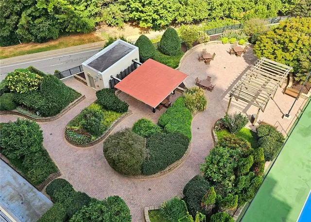 an aerial view of a house with garden space and outdoor space