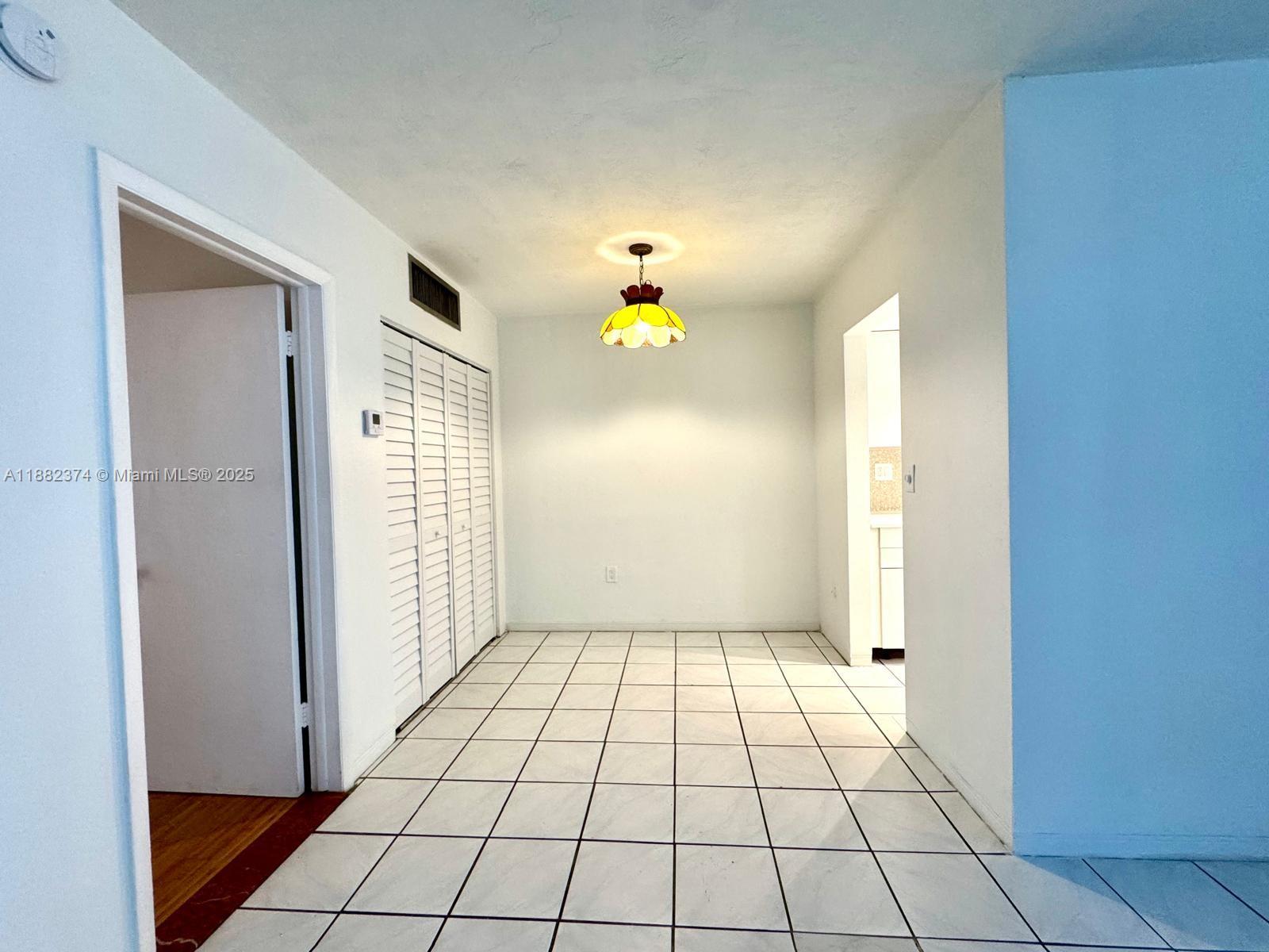 1475 Northeast 125th Terrace, Unit 404B North Miami, FL 33161 - Photo 10 of 22 a view of an empty room