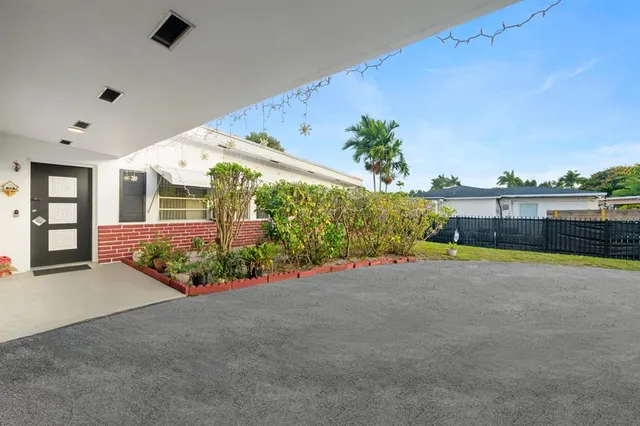 a view of swimming pool with an outdoor seating