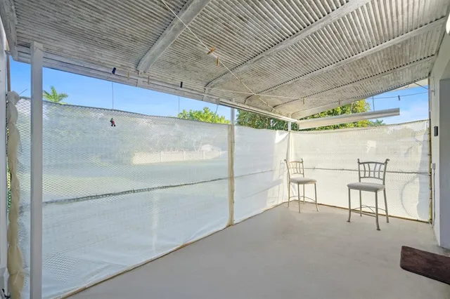 a empty room with windows