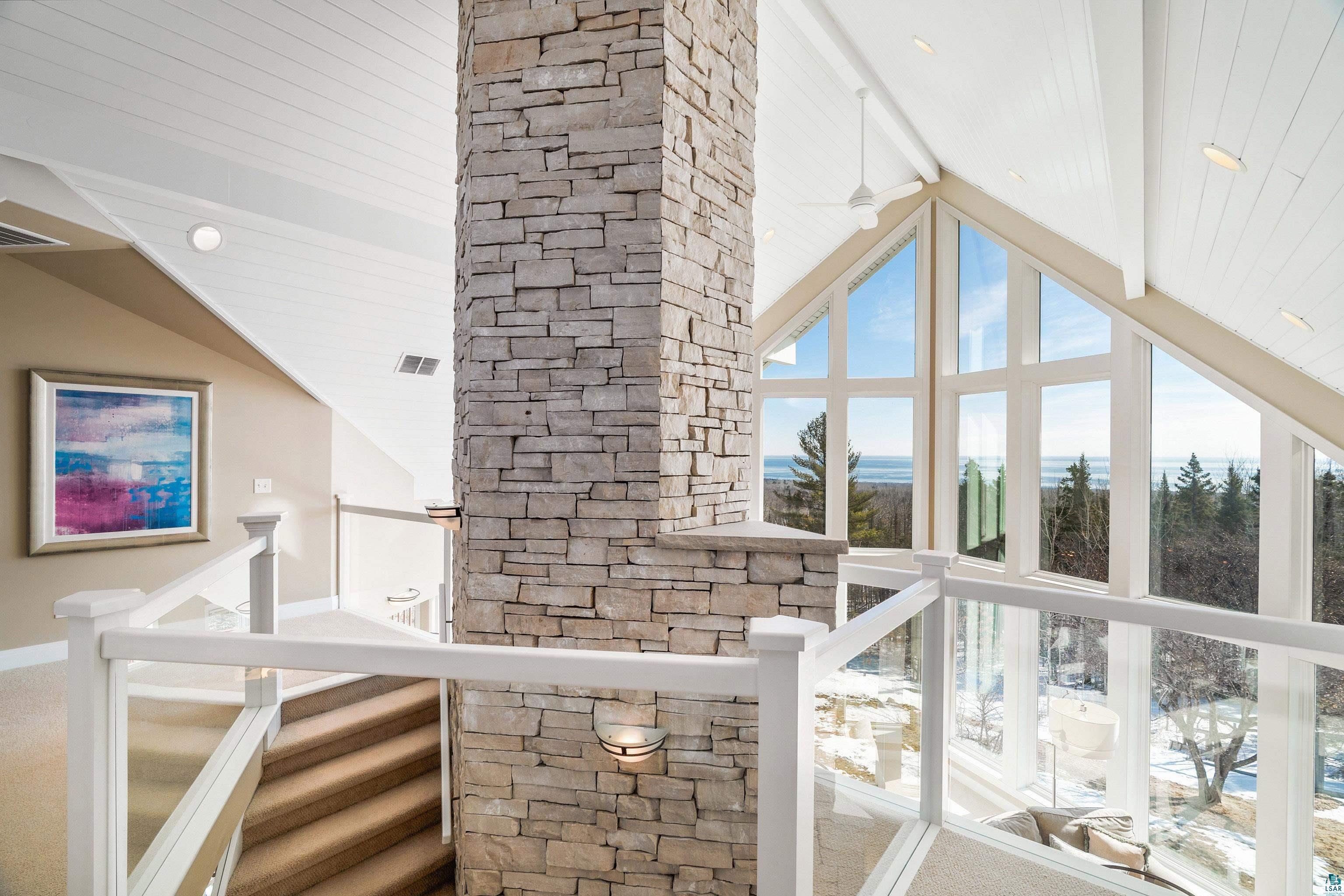 5290 Lakewood Road Duluth, MN 55804 - Photo 22 of 50 Landing overlooking beamed ceiling in living room and Lake Superior