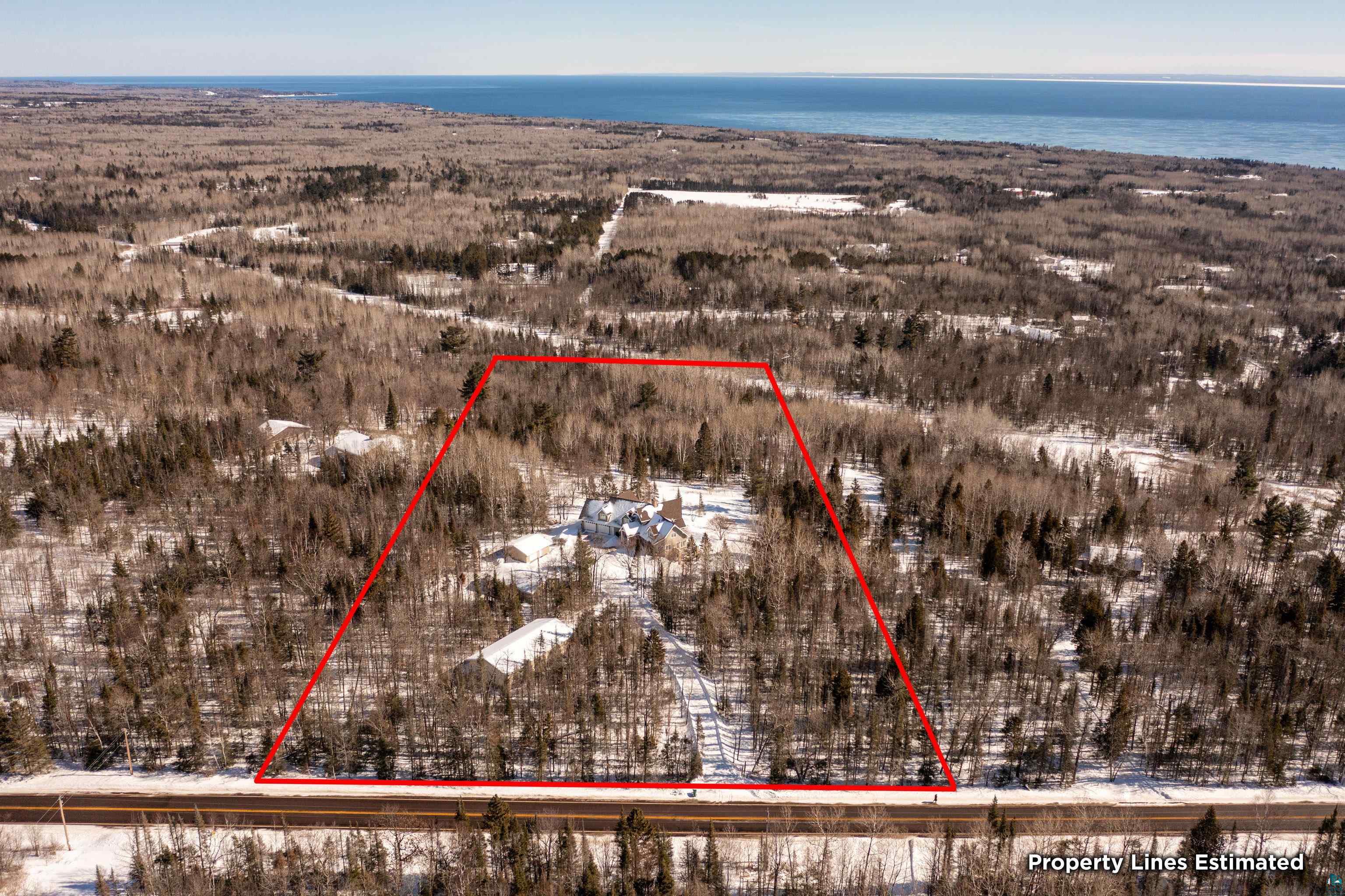 5290 Lakewood Road Duluth, MN 55804 - Photo 48 of 50 Snowy aerial view featuring a water view