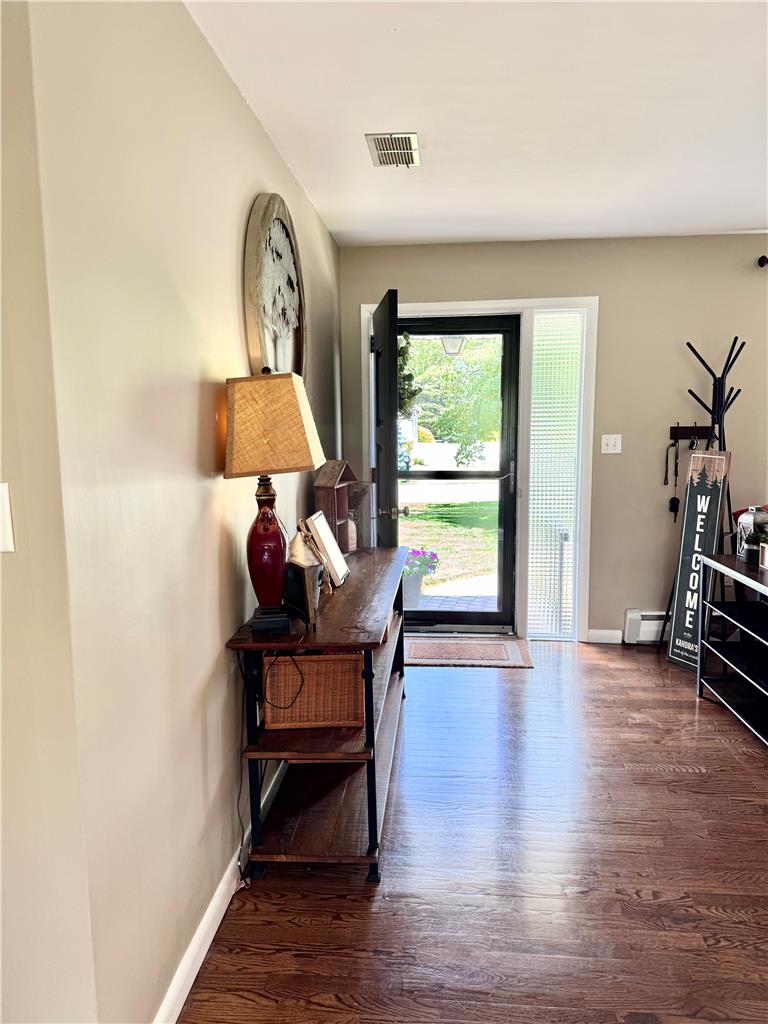 5334 Egypt Road Laurys Station, PA 18059 - Photo 6 of 55 Rich hardwood floors lead to a sun-filled entryway, welcoming you home.