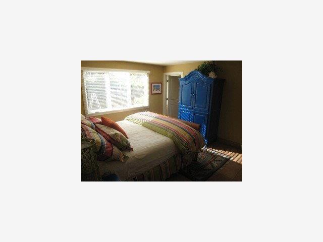 221 Florence Drive Aptos, CA 95003 - Photo 9 of 9 a bedroom with a bed and a dresser