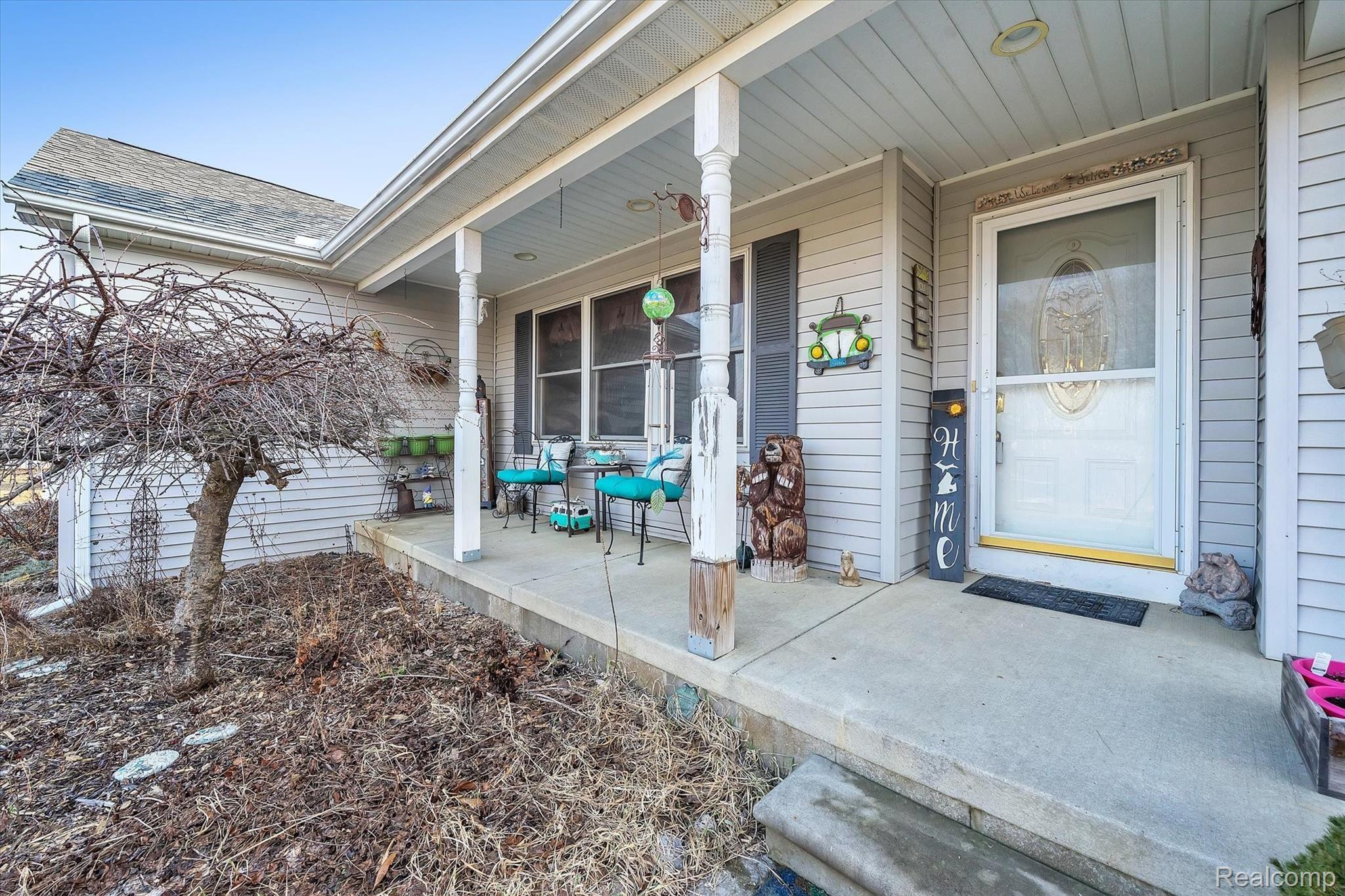 Covered front porch faces west.