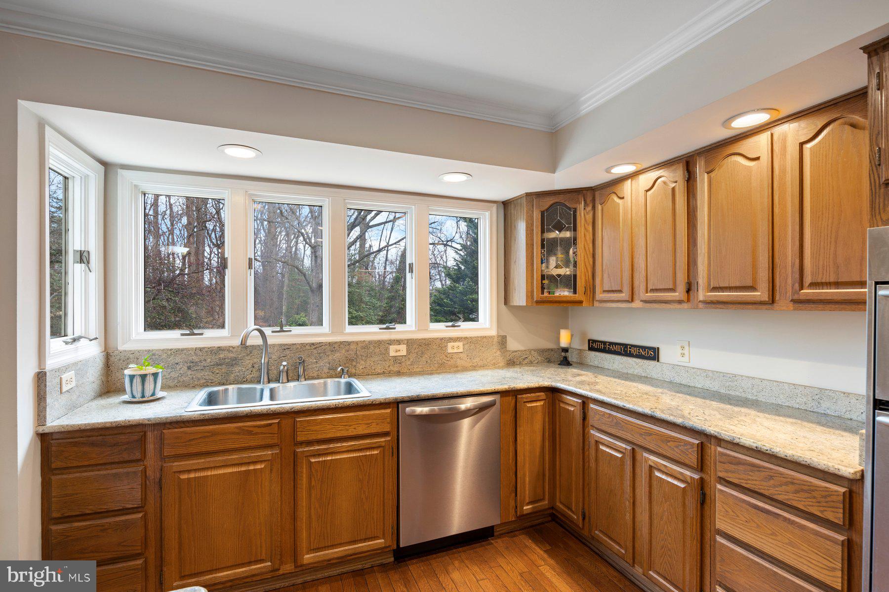 8037 Crest Road Laurel, MD 20723 - Photo 11 of 60 a kitchen with a sink and a window
