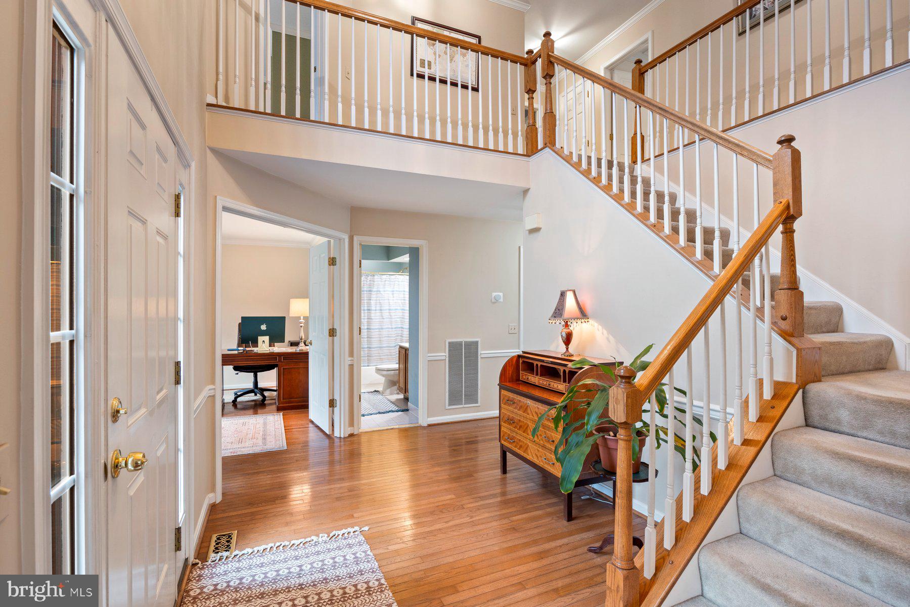 8037 Crest Road Laurel, MD 20723 - Photo 2 of 60 a view of entryway and hall with wooden floor