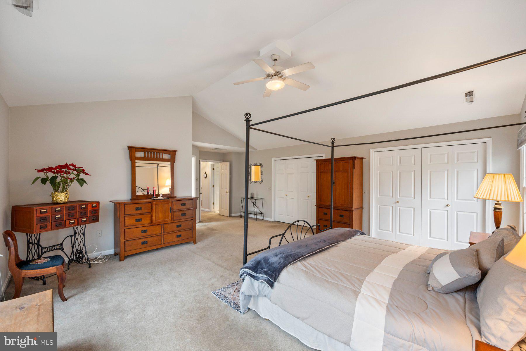 8037 Crest Road Laurel, MD 20723 - Photo 21 of 60 a bedroom with a bed dresser and wooden floor