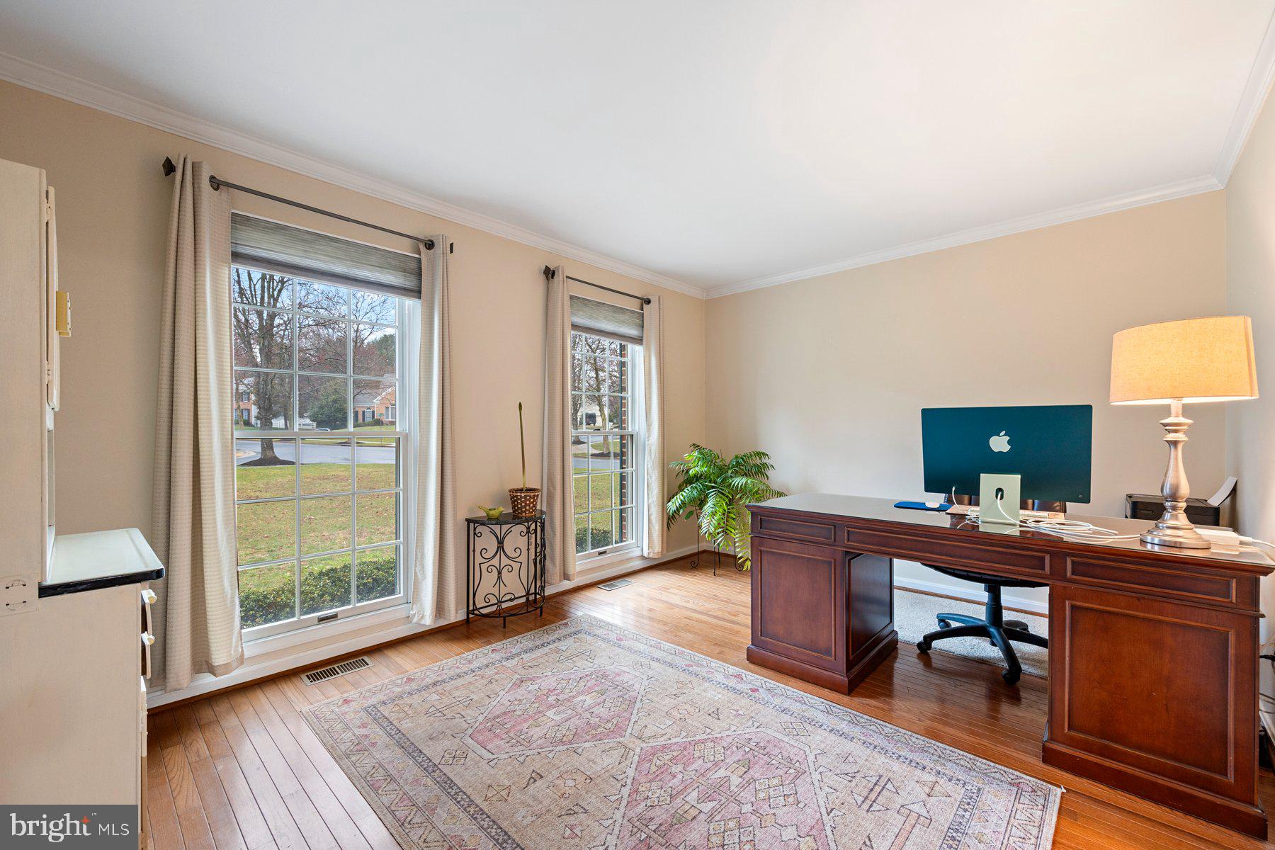 8037 Crest Road Laurel, MD 20723 - Photo 3 of 60 a view of a workspace with furniture and a window