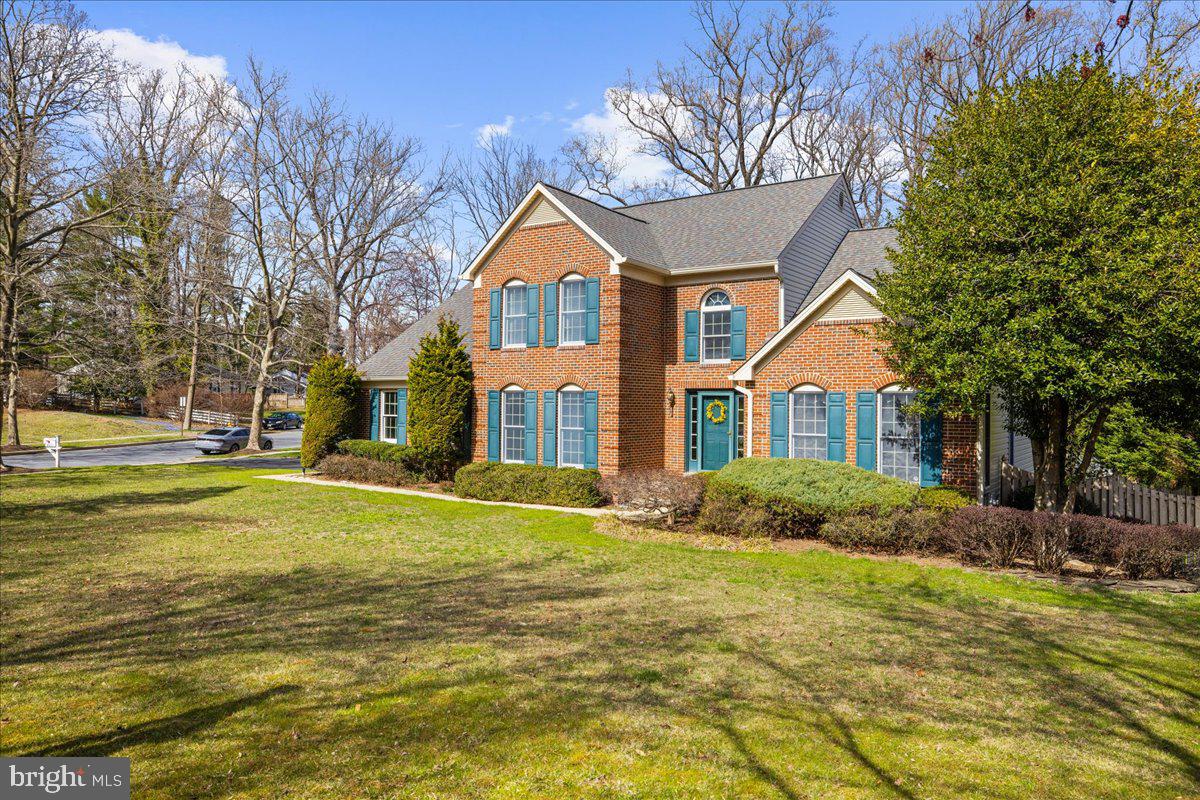 8037 Crest Road Laurel, MD 20723 - Photo 42 of 60 a front view of a house with a yard