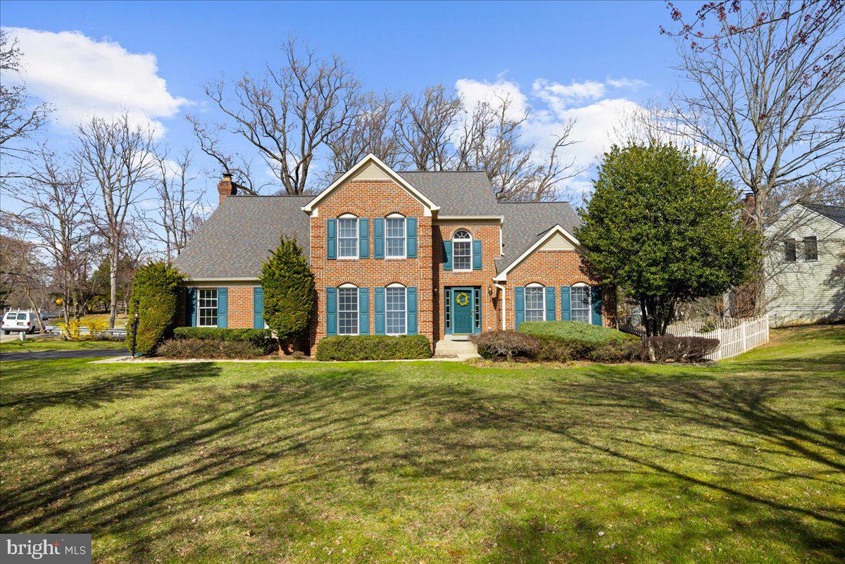 8037 Crest Road Laurel, MD 20723 - Photo 45 of 60 a front view of a house with a yard
