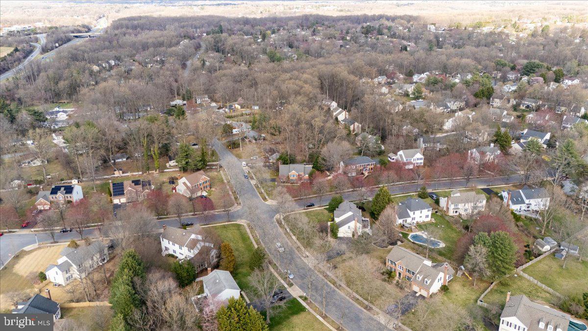 8037 Crest Road Laurel, MD 20723 - Photo 49 of 60 an aerial view of a city with lots of residential buildings
