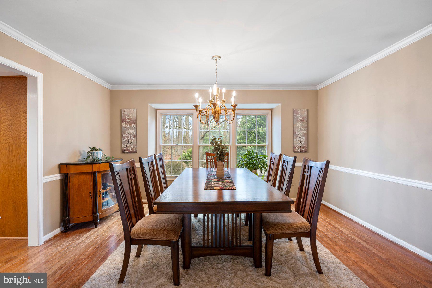 8037 Crest Road Laurel, MD 20723 - Photo 6 of 60 a view of a dining room with furniture window and wooden floor