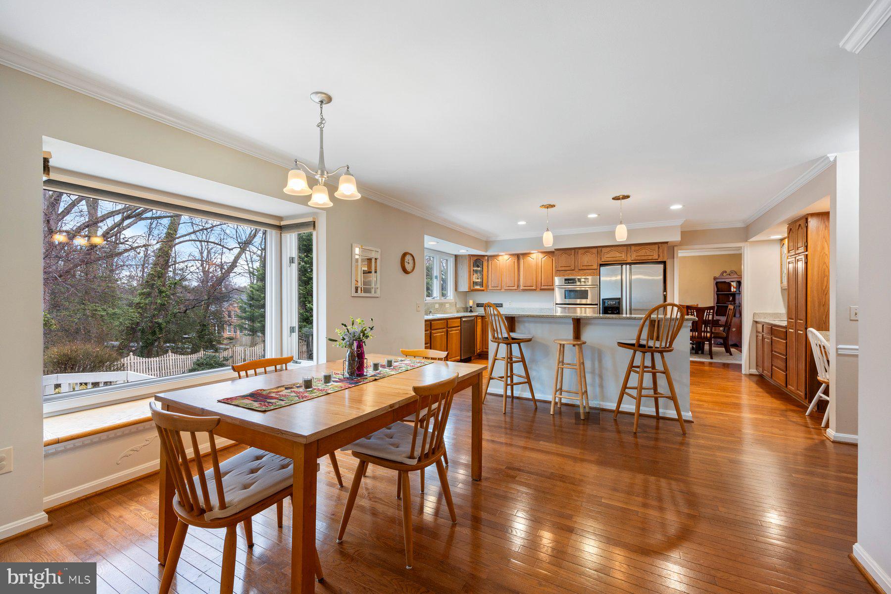 8037 Crest Road Laurel, MD 20723 - Photo 7 of 60 a dining room with furniture window wooden floor