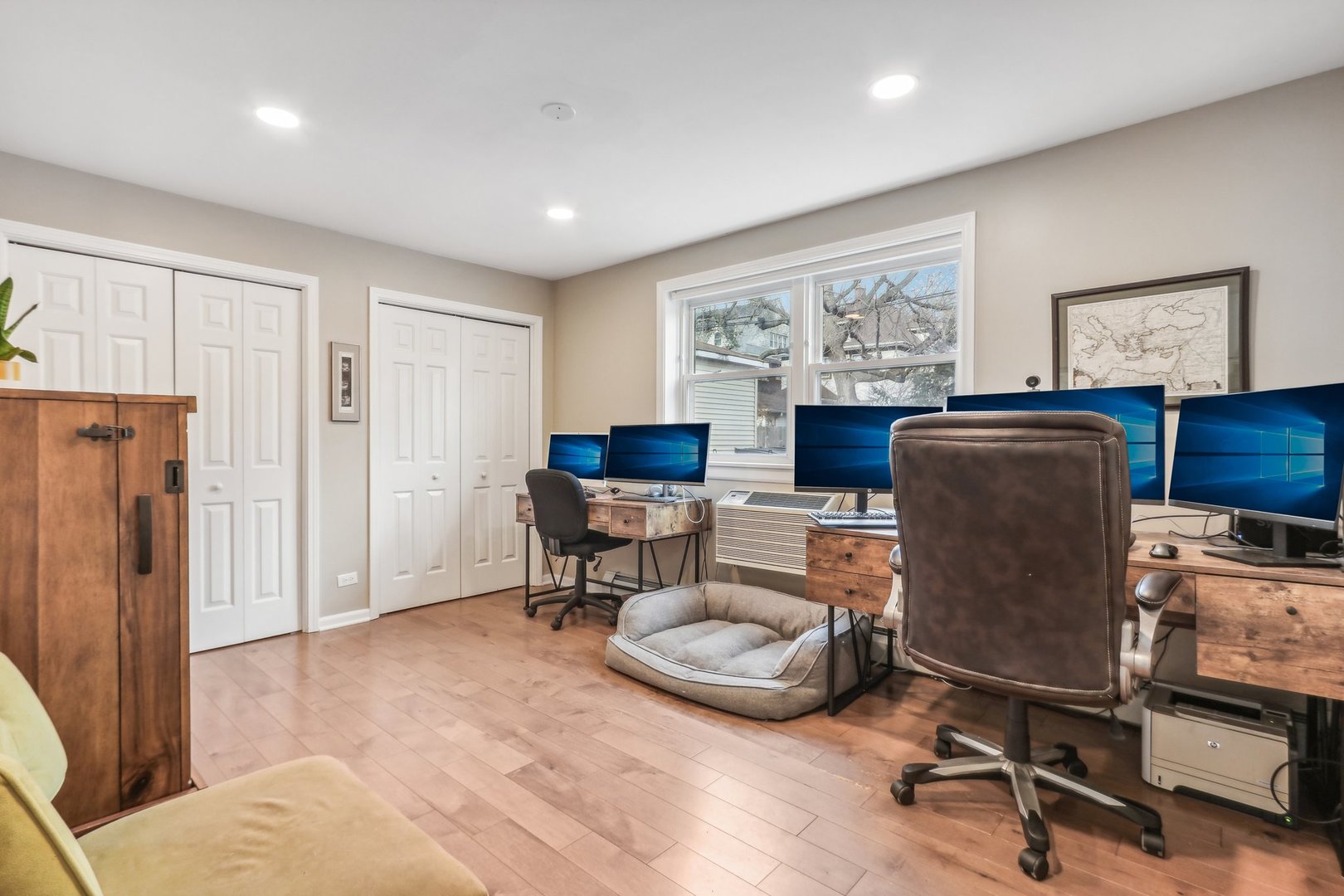 815 Reba Place, Unit 104 Evanston, IL 60202 - Photo 22 of 26 a living room with furniture windows and a table