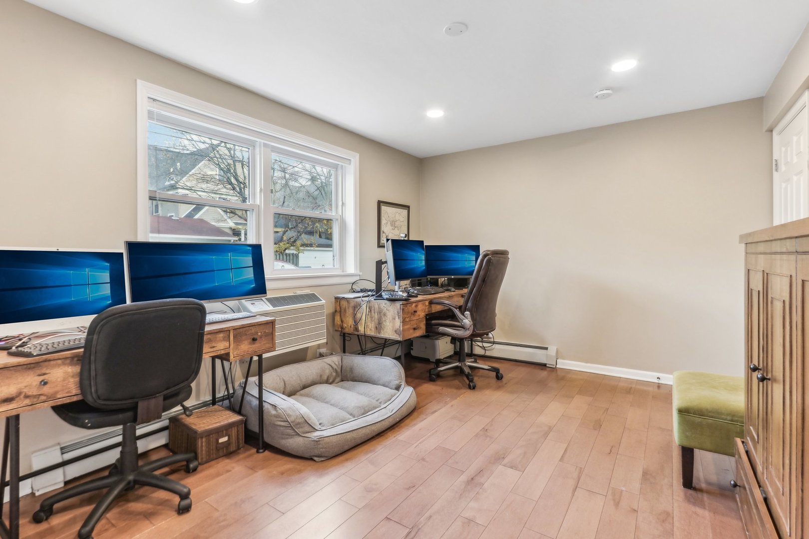 815 Reba Place, Unit 104 Evanston, IL 60202 - Photo 23 of 26 a work room with furniture and a window