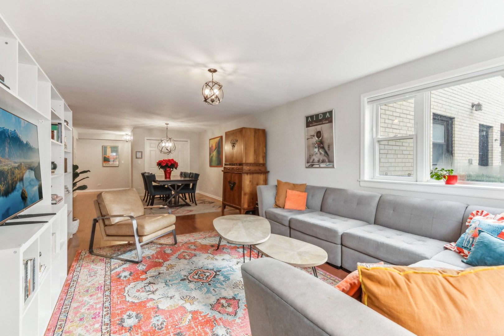 815 Reba Place, Unit 104 Evanston, IL 60202 - Photo 6 of 26 a living room with furniture and wooden floor