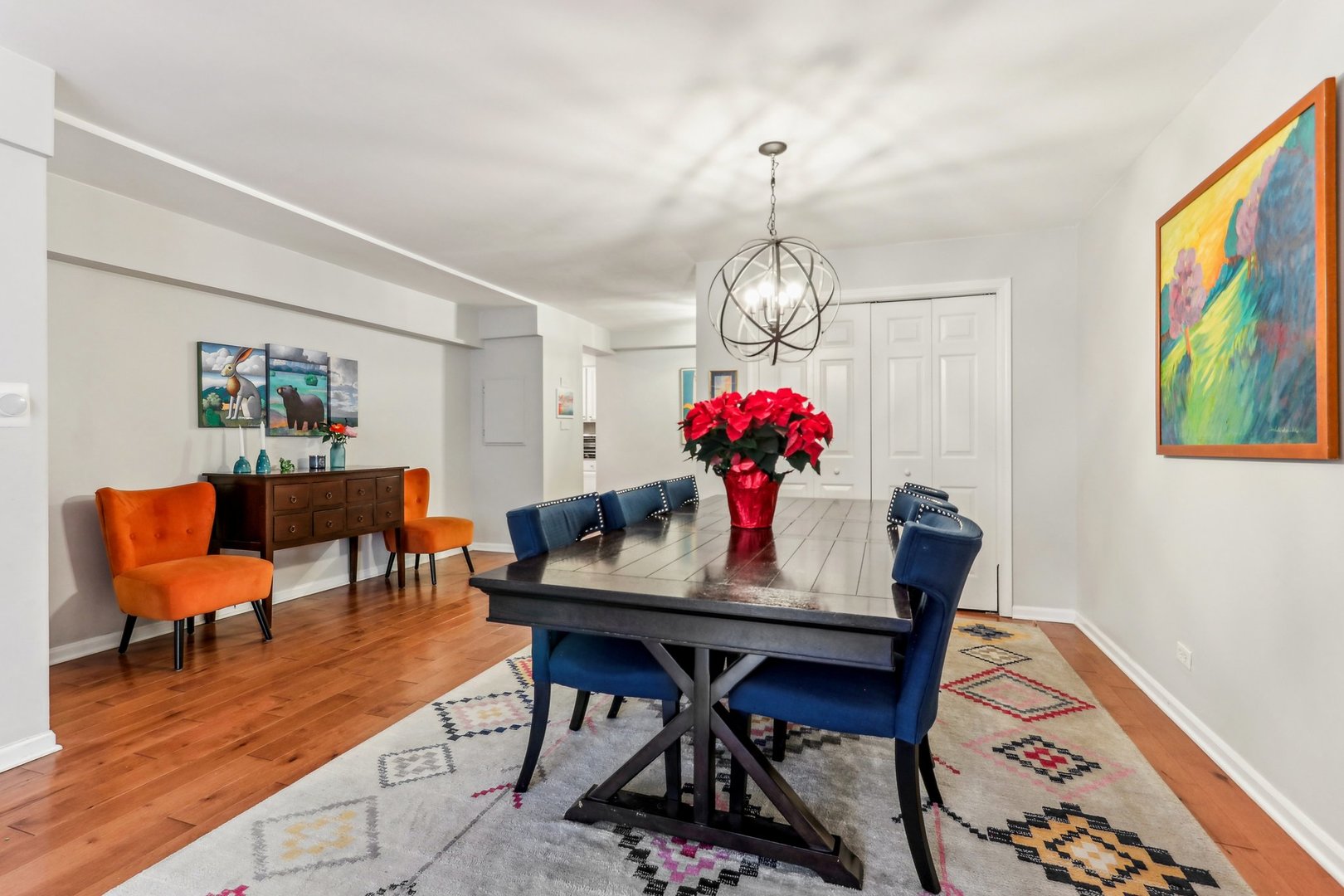 815 Reba Place, Unit 104 Evanston, IL 60202 - Photo 8 of 26 a view of a dining room with furniture and wooden floor