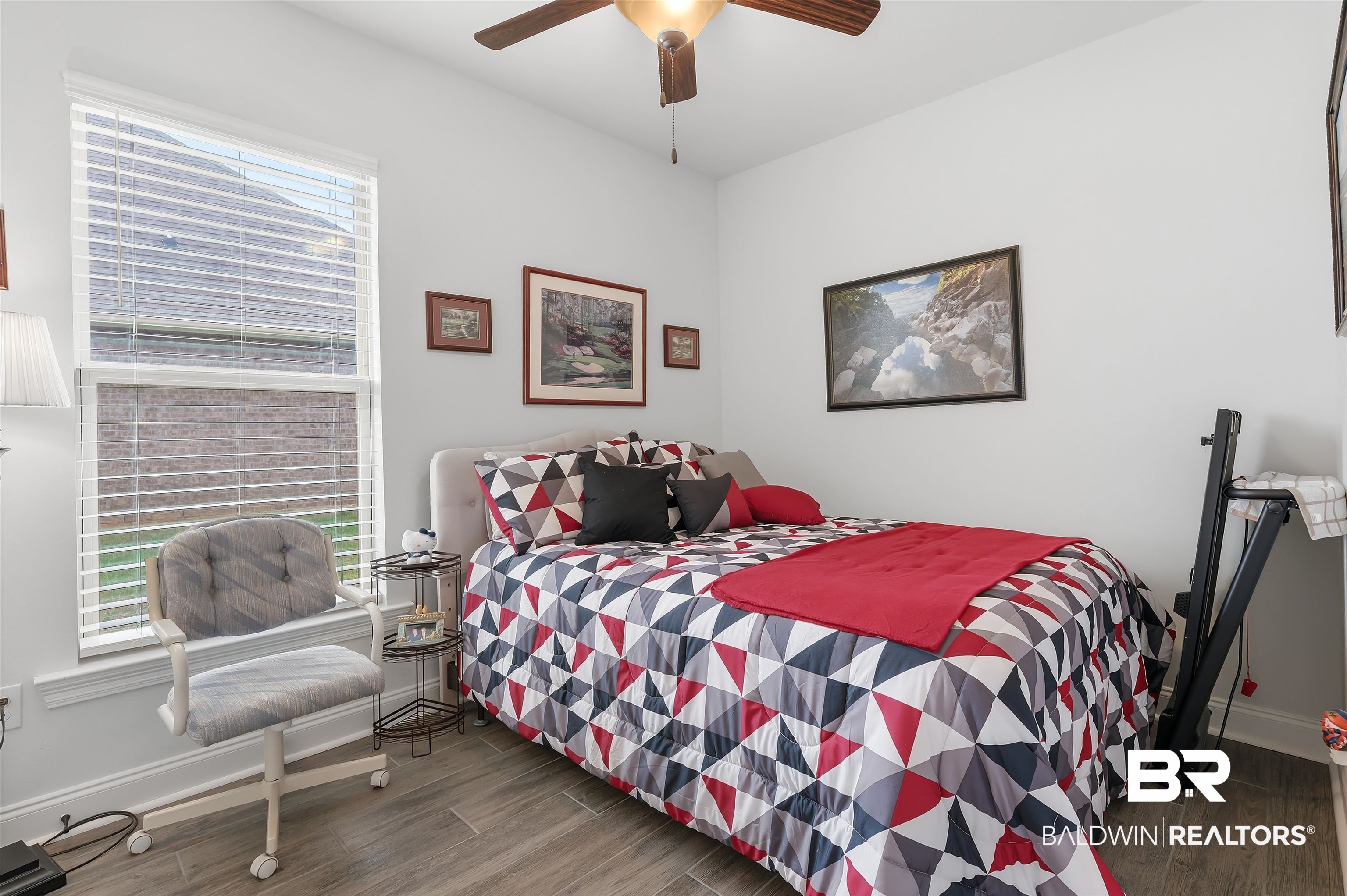 22512 Putter Lane Foley, AL 36535 - Photo 11 of 27 Bedroom featuring wood finished floors and a ceiling fan