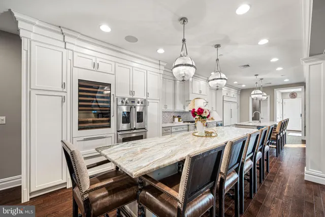 a view of a dining area with furniture window and wooden floor
