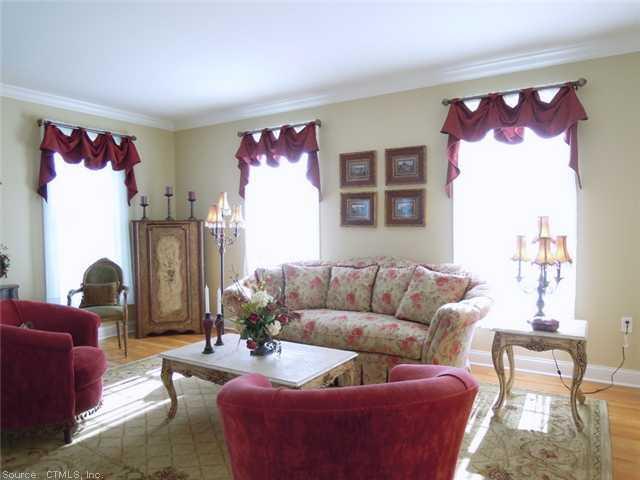 15 Kenington Road, Unit 15 Avon, CT 06001 - Photo 1 of 1 a living room with furniture and a window