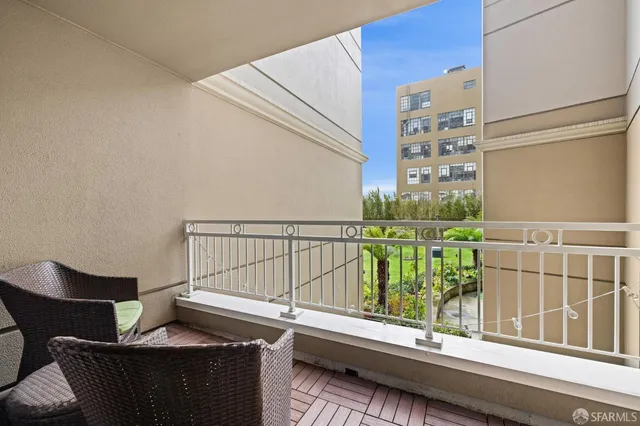 a view of balcony with a potted plant