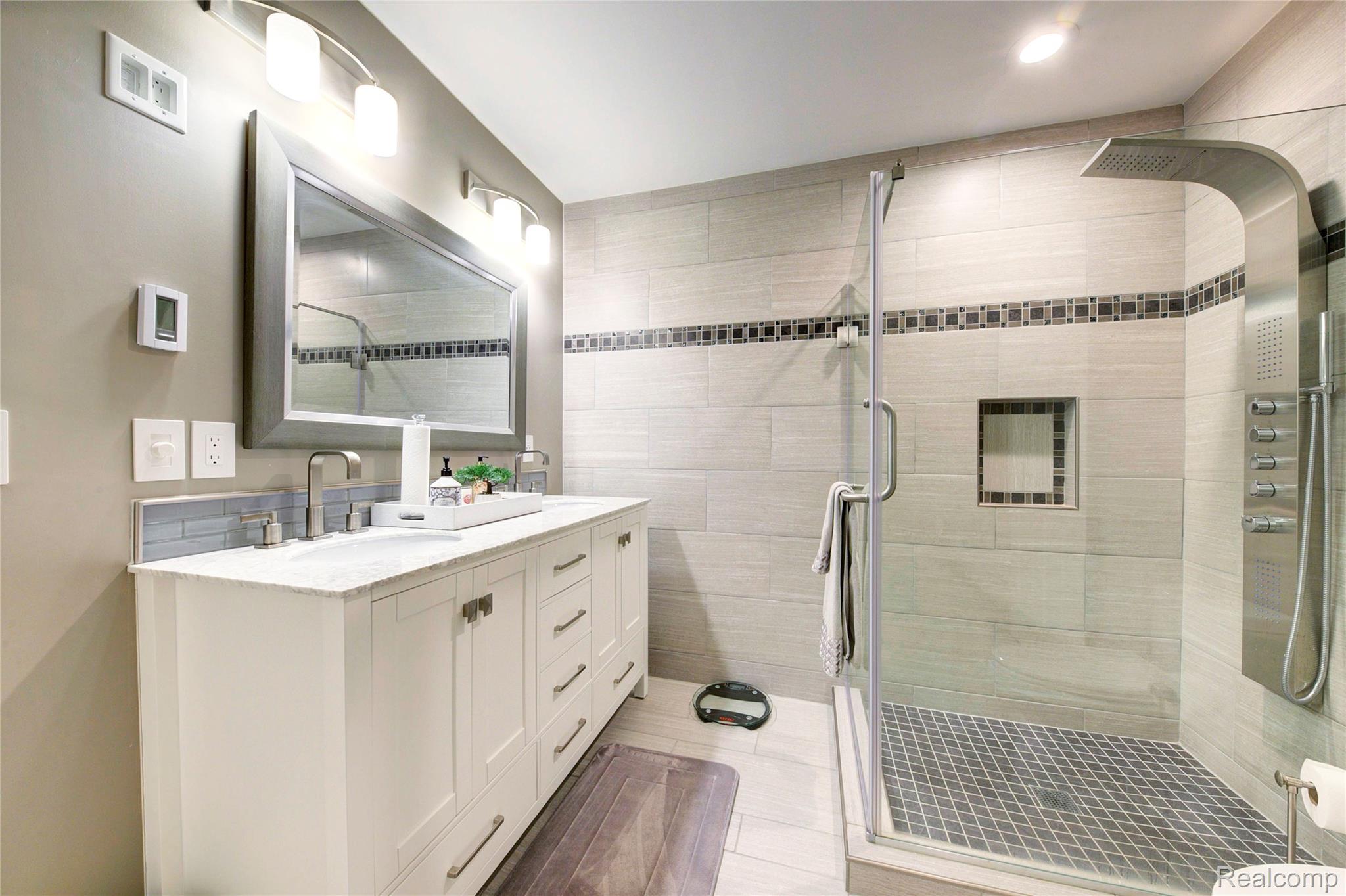 50411 Lansdowne Road Canton, MI 48188 - Photo 52 of 75 Full bathroom featuring a stall shower and double vanity