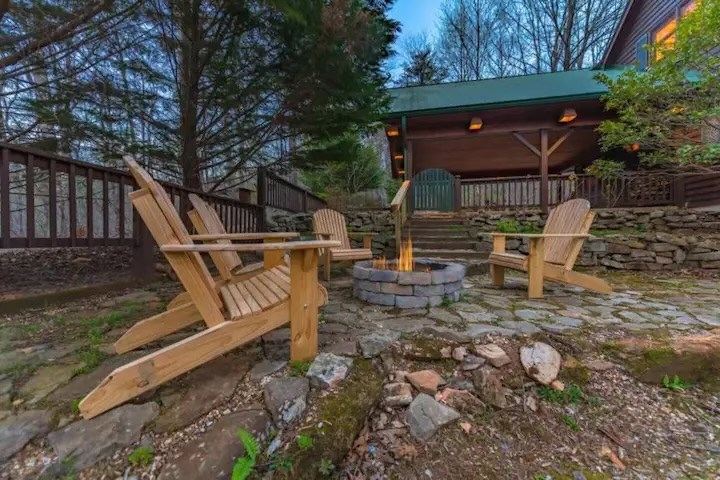 197 Smith Hill Road Blue Ridge, GA 30513 - Photo 30 of 36 a view of house with a back yard