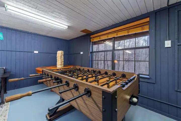 197 Smith Hill Road Blue Ridge, GA 30513 - Photo 36 of 36 a table chair sitting in a room next to a window