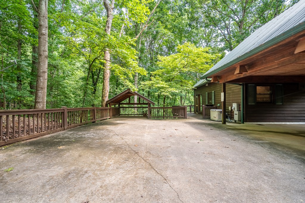197 Smith Hill Road Blue Ridge, GA 30513 - Photo 4 of 36 a view of a house with backyard and tree