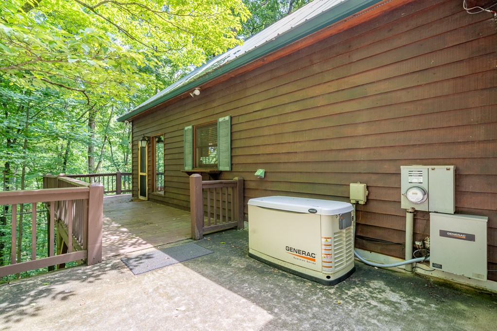 197 Smith Hill Road Blue Ridge, GA 30513 - Photo 5 of 36 a view of a backyard with wooden fence