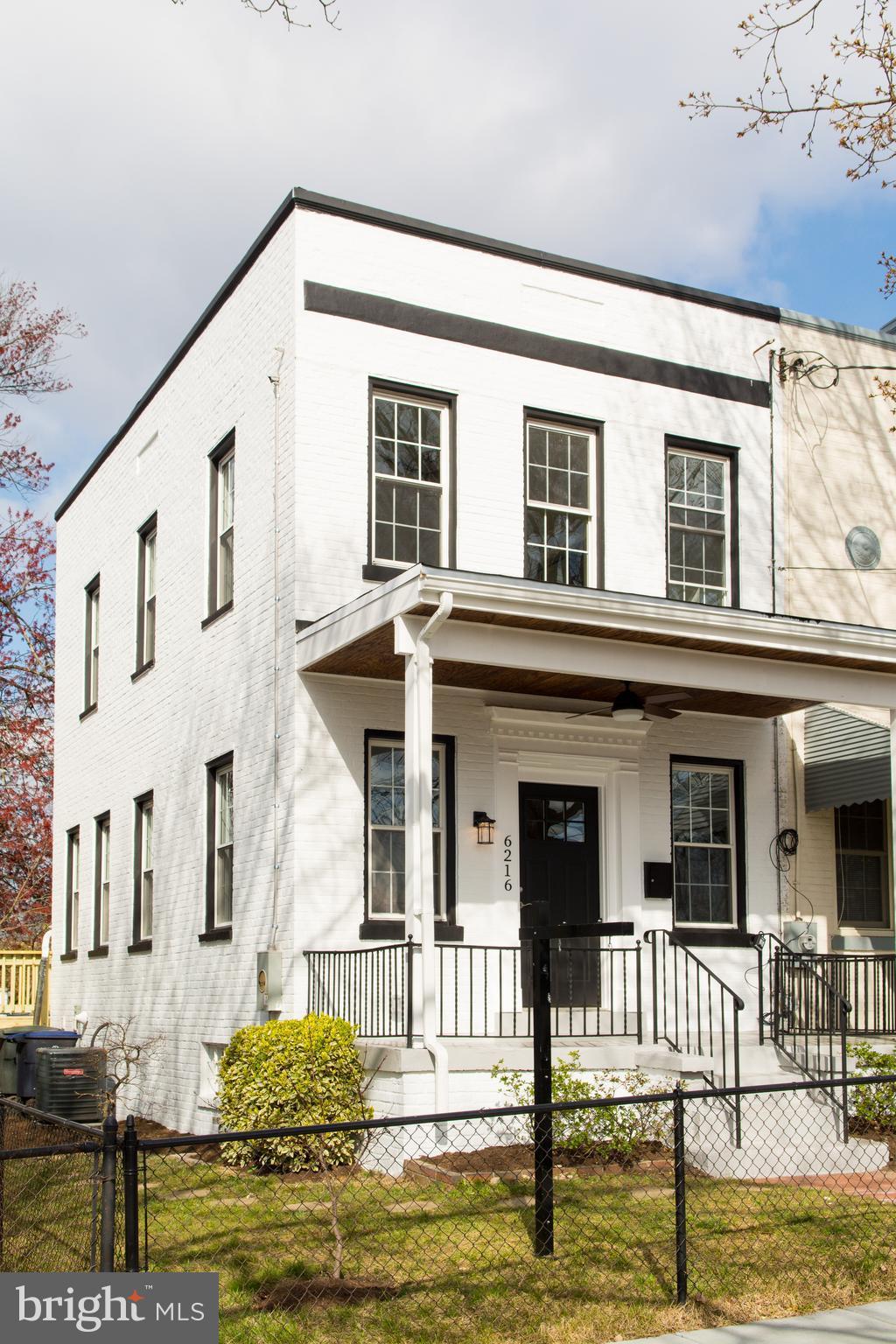6216 5th Street Northwest Washington, DC 20011 - Photo 1 of 25 a front view of a house with swimming pool