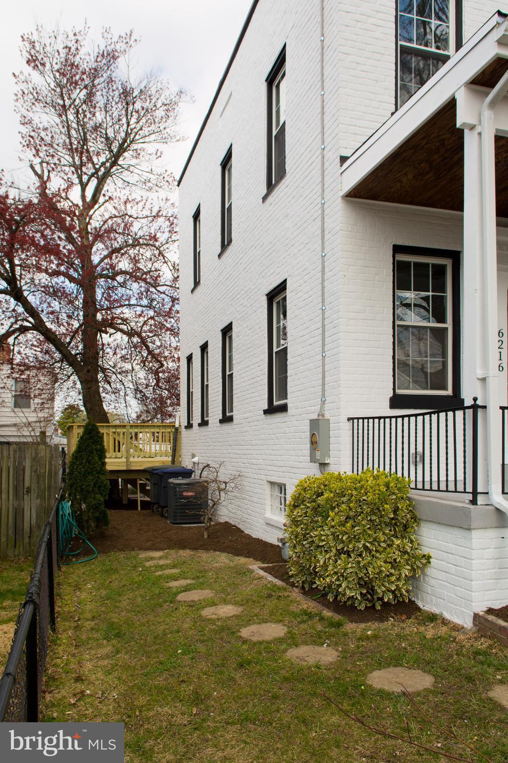 6216 5th Street Northwest Washington, DC 20011 - Photo 2 of 25 a view of a house with a yard