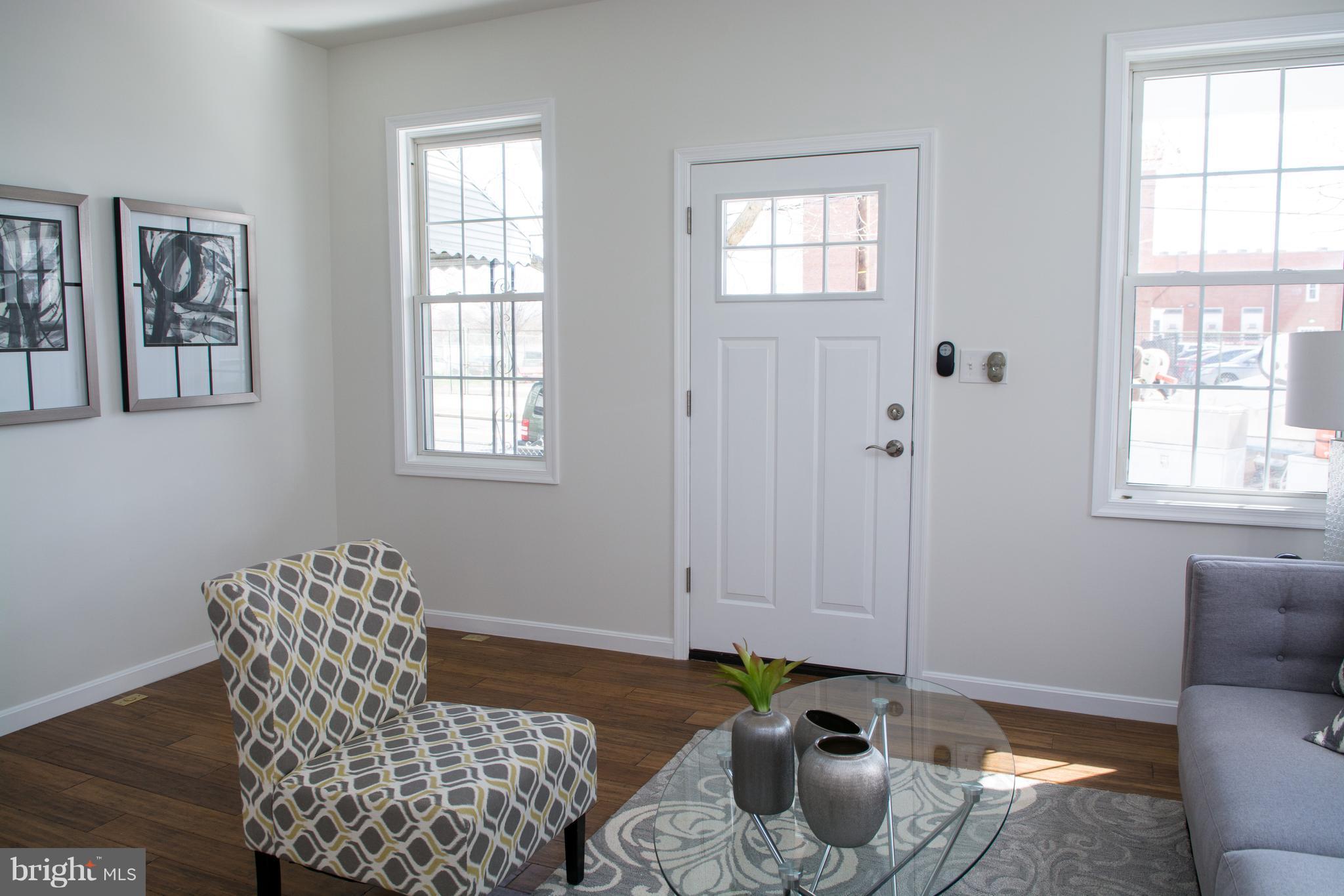 6216 5th Street Northwest Washington, DC 20011 - Photo 3 of 25 a room with furniture and window