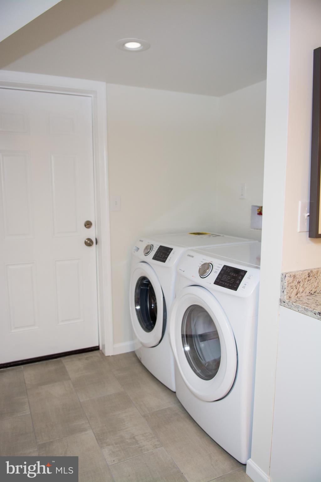 6216 5th Street Northwest Washington, DC 20011 - Photo 21 of 25 a utility room with dryer and washer